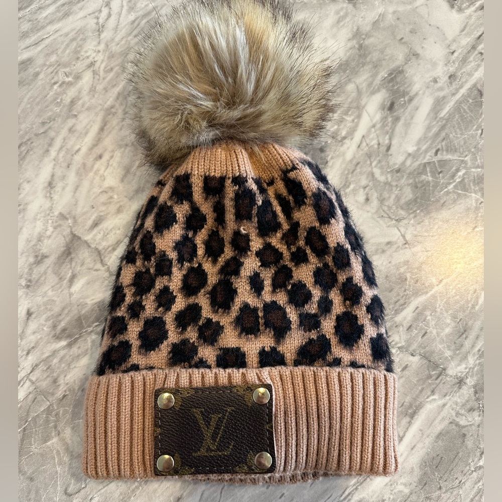 Leopard Pom beanie with Louis Vuitton patch